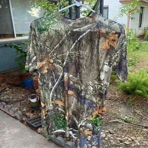 Tree camp Realtree polyester tee.